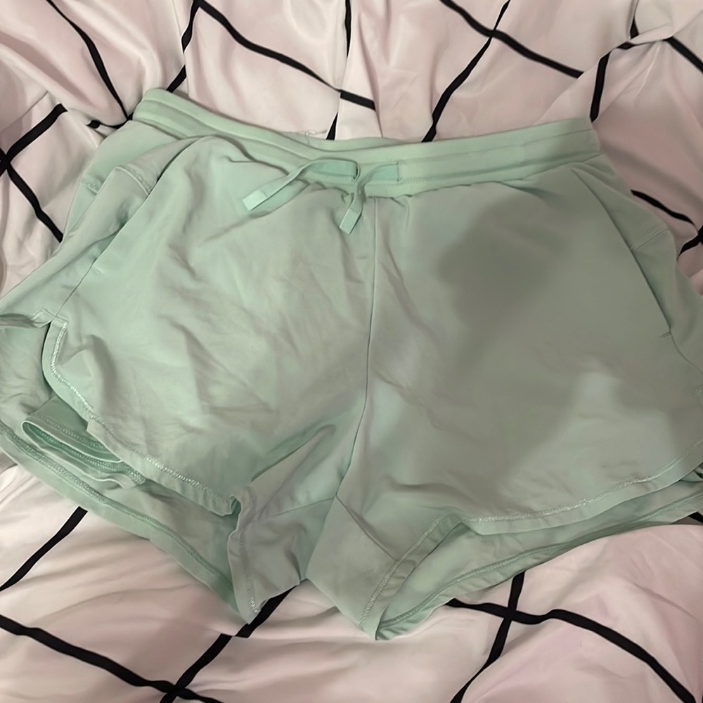 teal flowy shorts